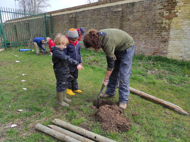 Boys Instructing Tree Planting