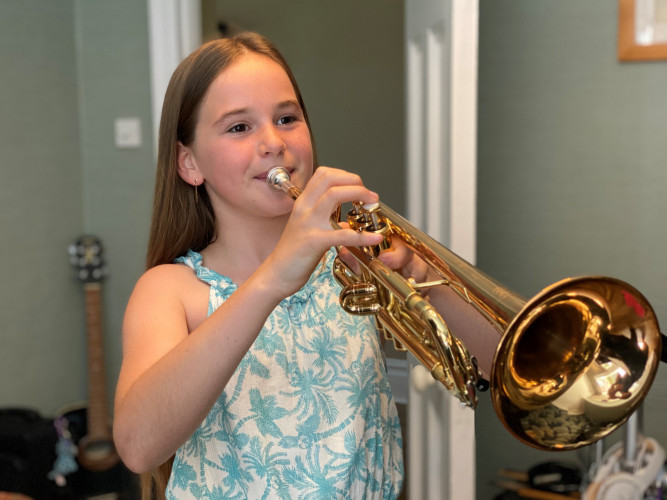 Izzy Playing Her Trumpet 2