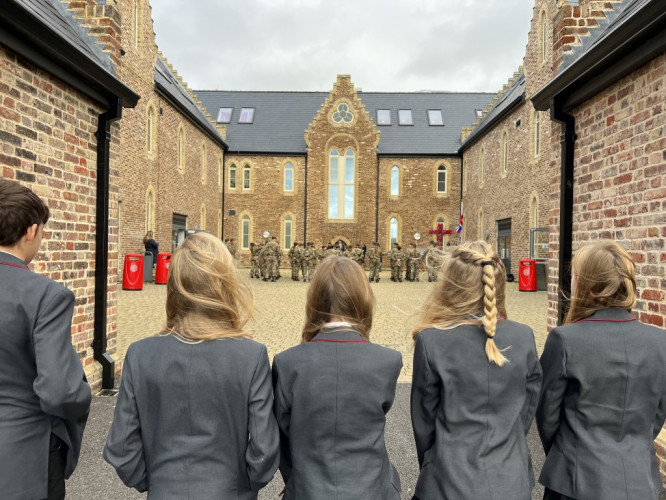 Students Watching Remembrance Medium